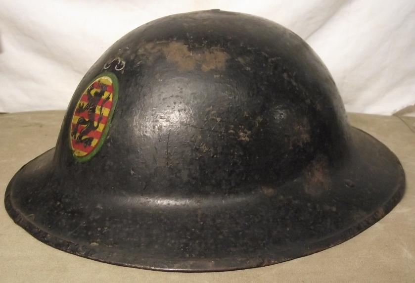 WW1 Brodie Helmet with Black Lion Frontal Badge.