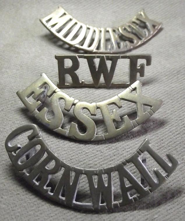 4 X British Brass Shoulder Titles.