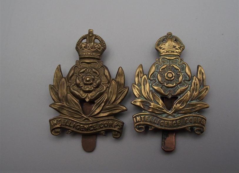 2 X Intelligence Corps Cap Badges.