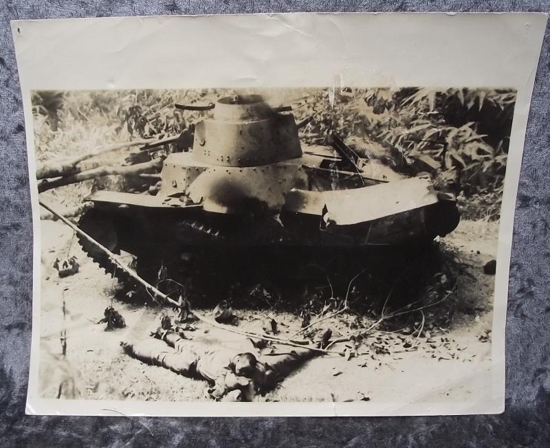 Press Photo, Battle Scenes From Malaya. Smashed Japanese Tank.