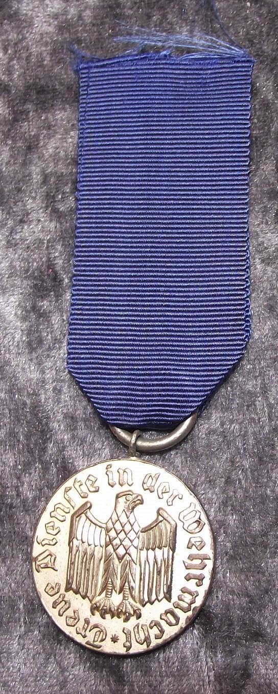 57 Pattern Wehrmacht 4 Year Long Service Medal. S&L