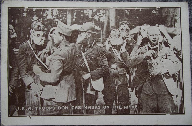 WW1 British Post Card. U.S. Troops Don Gas Masks.