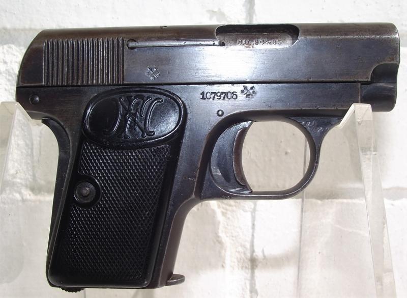 Deactivated FN Baby Browning Pistol.