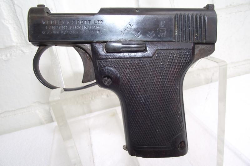 Deactivated Webley Model 1912 Pistol.