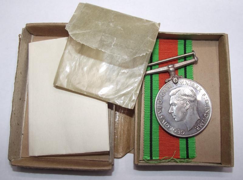 Boxed Defence Medal. c/o South Arica House, Trafalgar Square. .