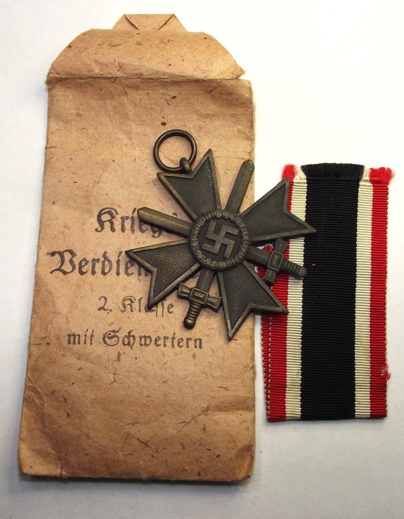 WW2 German KVK 2nd Class with Swords and Packet of Issue.