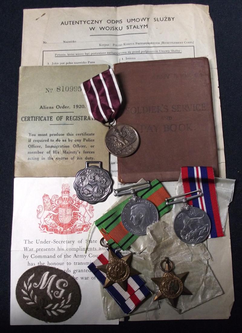 WW2 Polish Army Pay Book, Certificate of Registration and Medals.