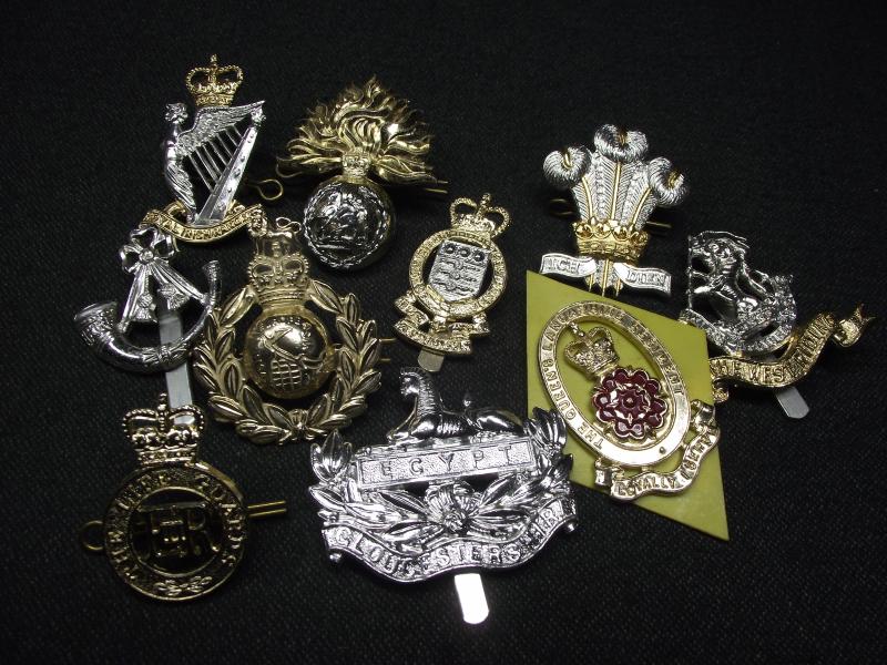 10 X British Military Anodised Regimental Cap Badges.