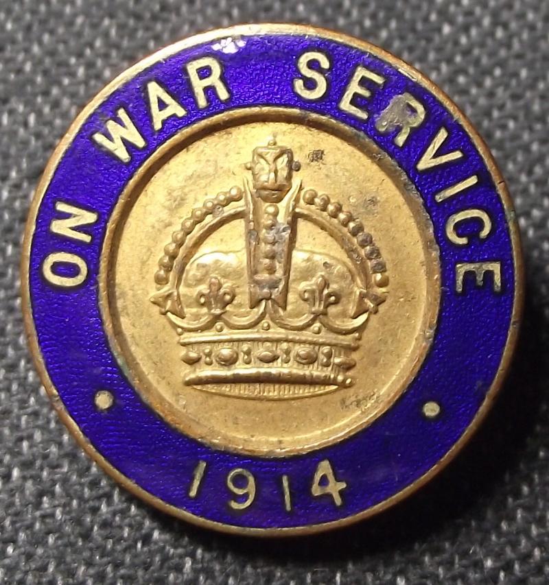 WW1 ''On War Service'' Enamel Badge. 1914. Numbered and Maker Marked.