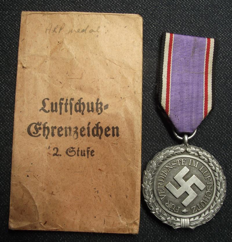 2nd Class Luftschutz Medal and Paper Packet of Issue. Foerster & Barth