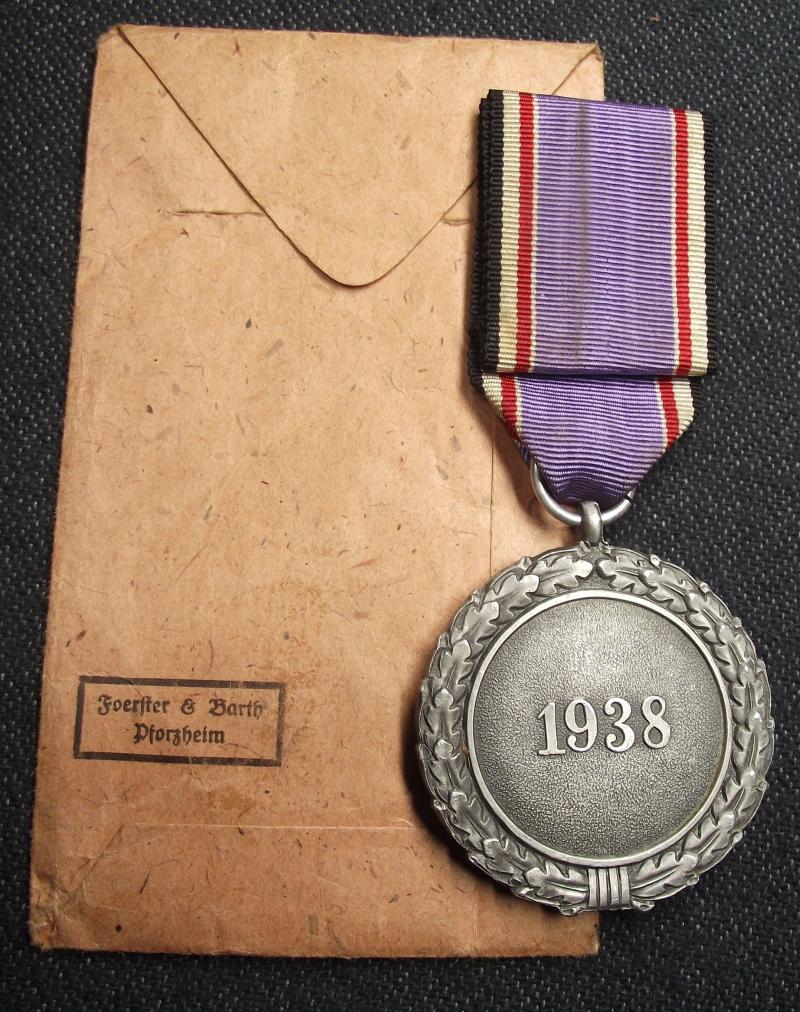 2nd Class Luftschutz Medal and Paper Packet of Issue. Foerster & Barth