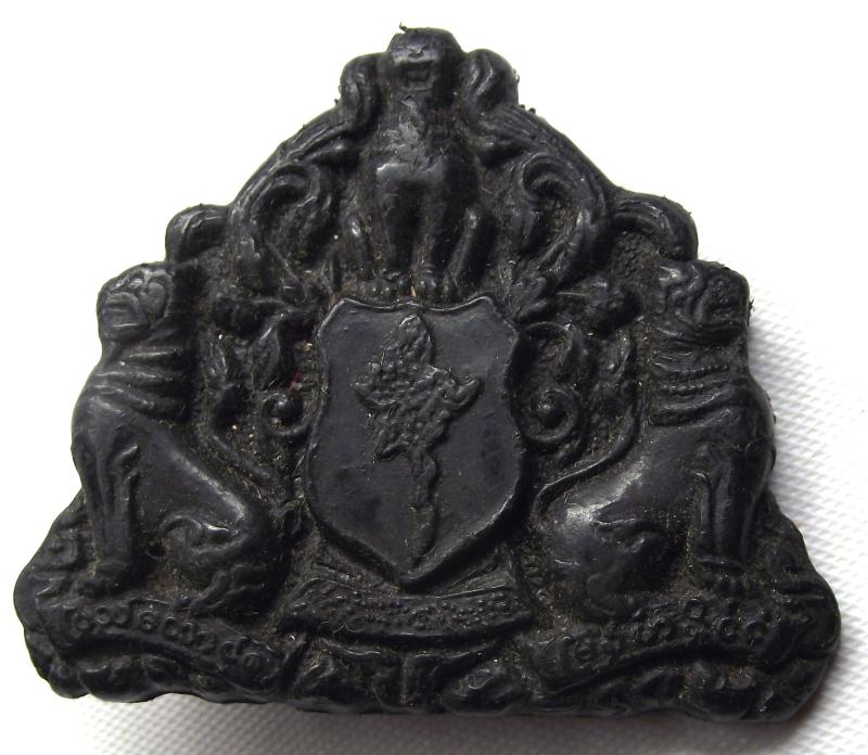 Plastic Economy Burma Army Cap Badge.