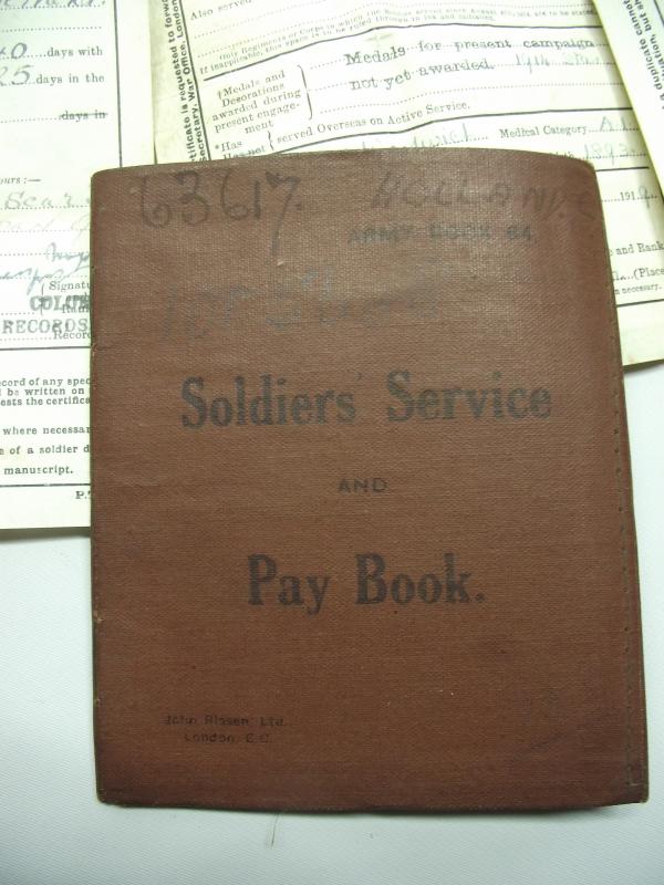 WW1 British Pay Book and Related Discharge Paperwork.