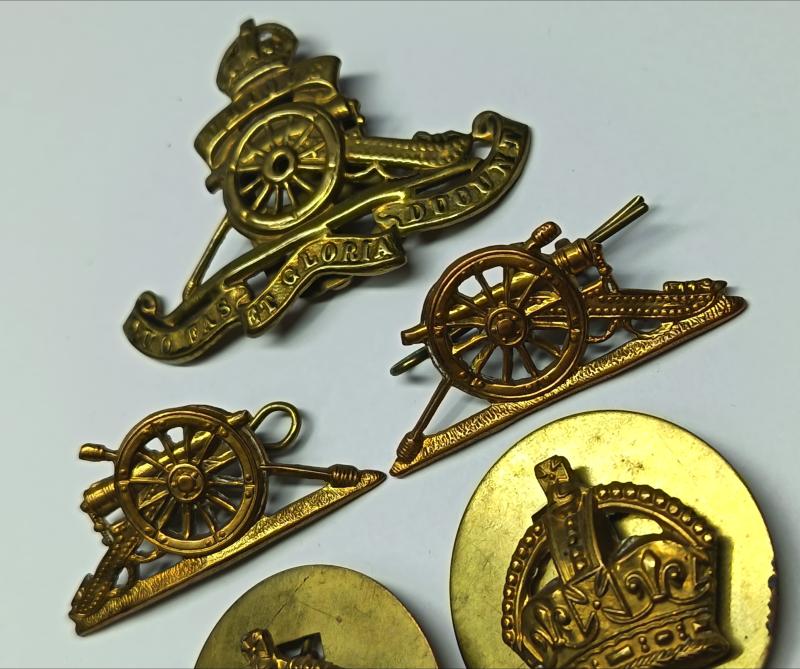 RA and Welch Regiment Brass Insignia.