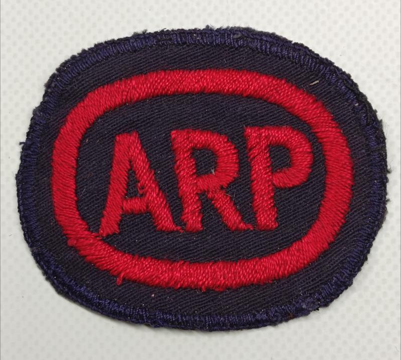 Red Oval ARP Breast Badge.