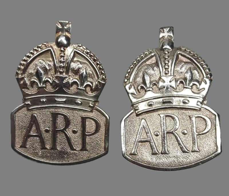 Two Silver ARP Membership Badges. Male and Female.